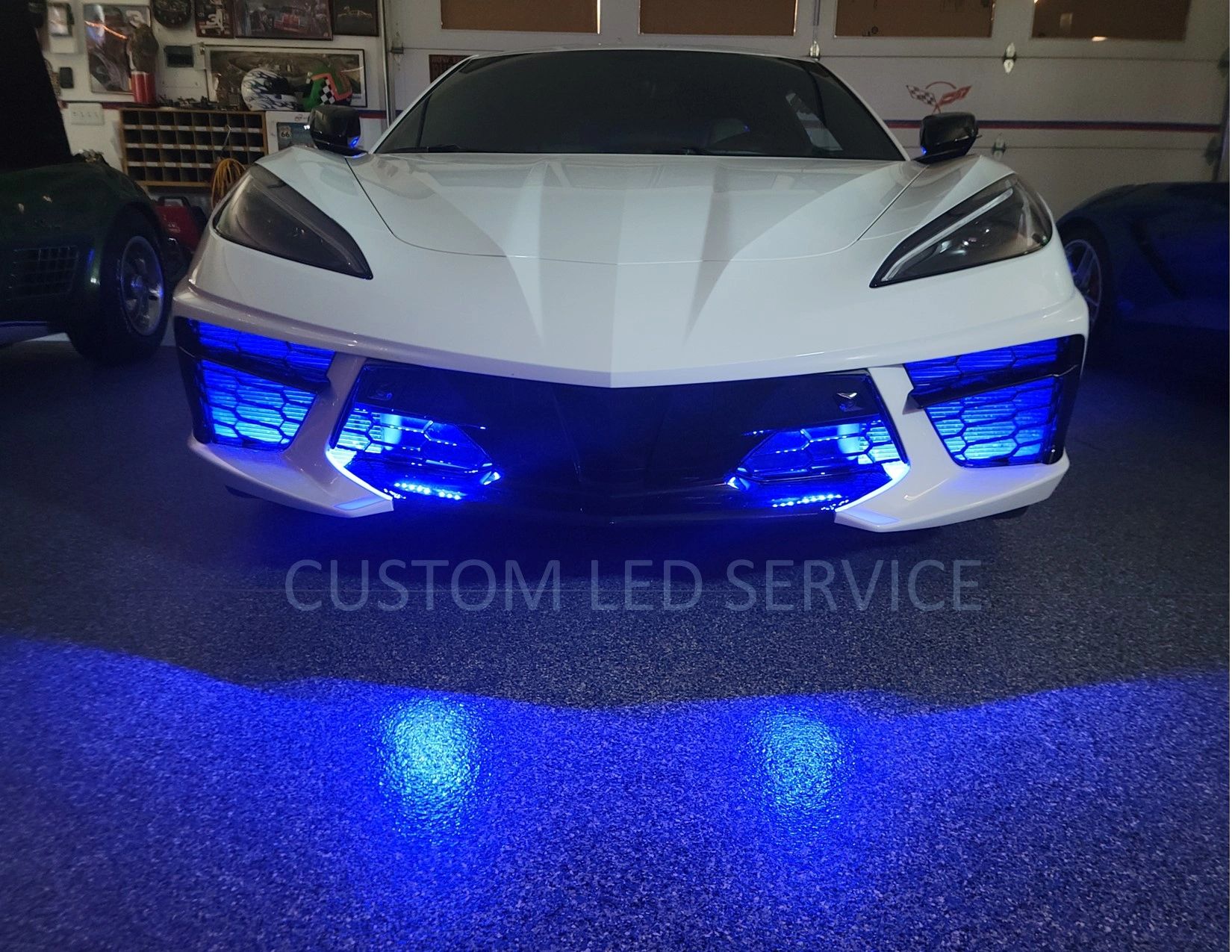 Corvette C8 with blue Custom L.E.D. grille lighting in the Centennial shop